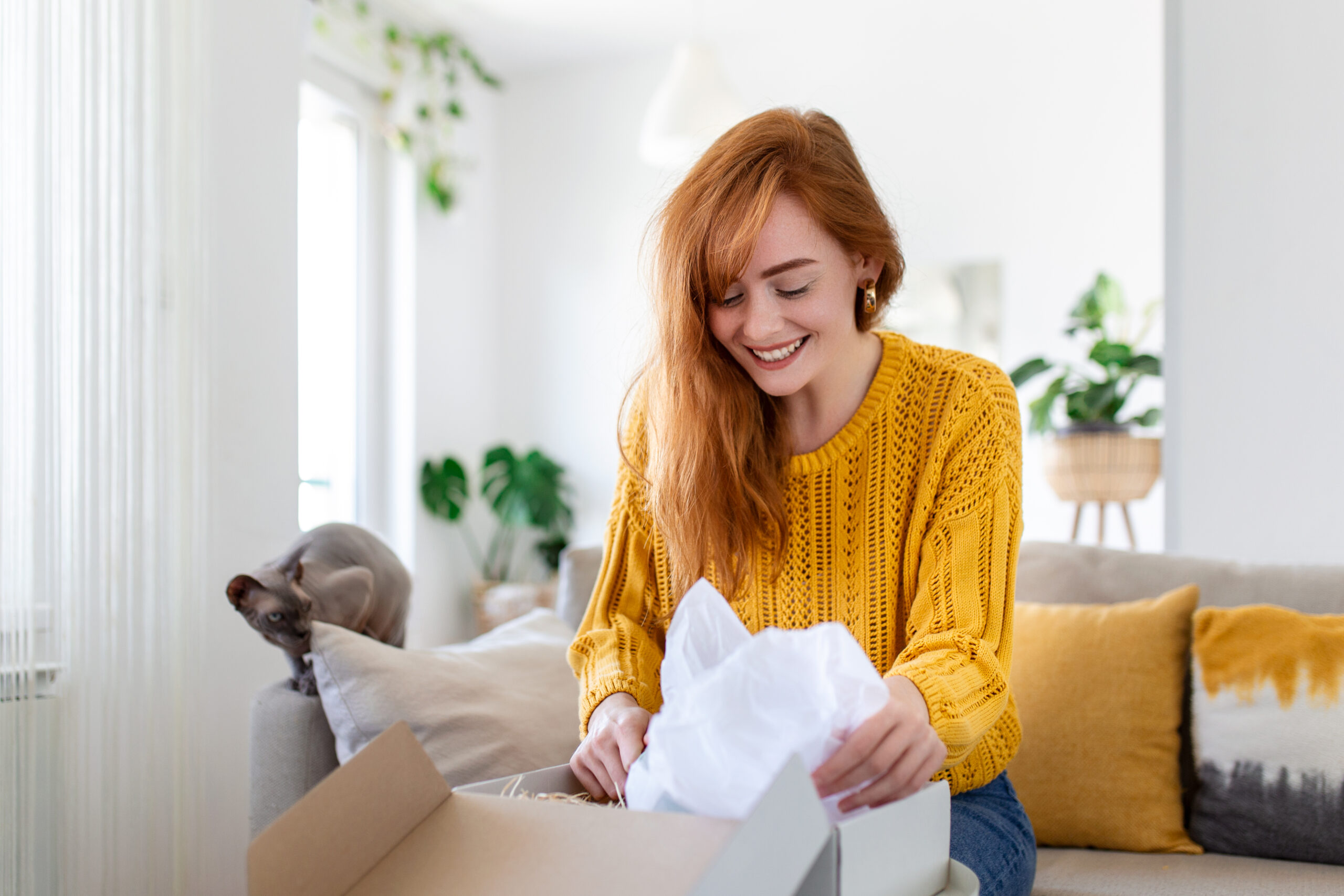 Happy customer unboxing a package at home, delivered efficiently by efillships 3PL services in Langwarrin, Victoria, Australia